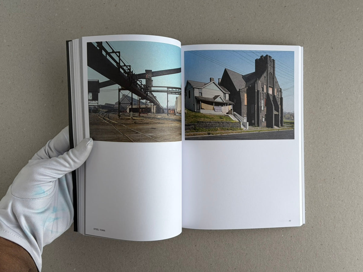 Open spread of Hotshoe Issue 214: Stephen Shore showing two colour photographs, with a gloved hand holding the book