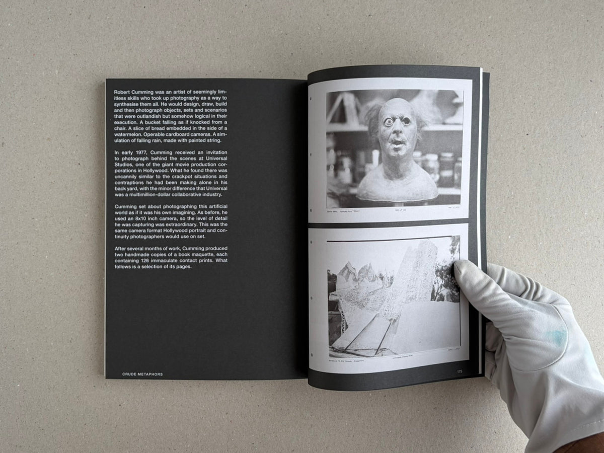 Open spread of Hotshoe Issue 215: At the Movies, showing a text page on the left and two black-and-white images on the right, with a gloved hand holding the page.
