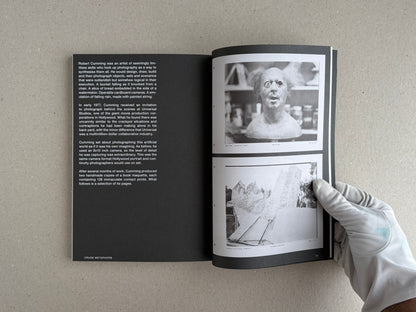 Open spread of Hotshoe Issue 215: At the Movies, showing a text page on the left and two black-and-white images on the right, with a gloved hand holding the page.