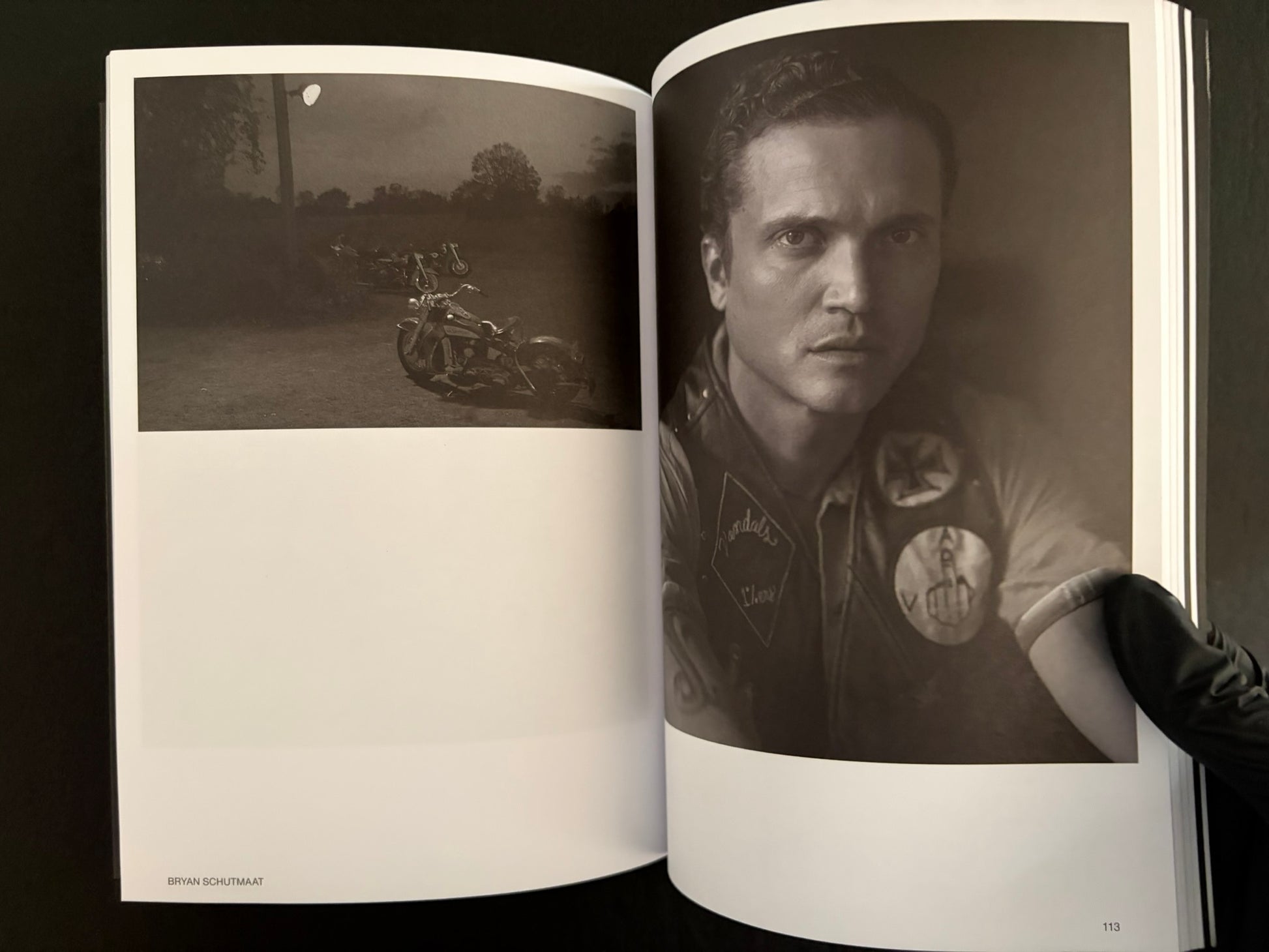 Interior spread from Hotshoe Issue 215 with a dark landscape image and a portrait