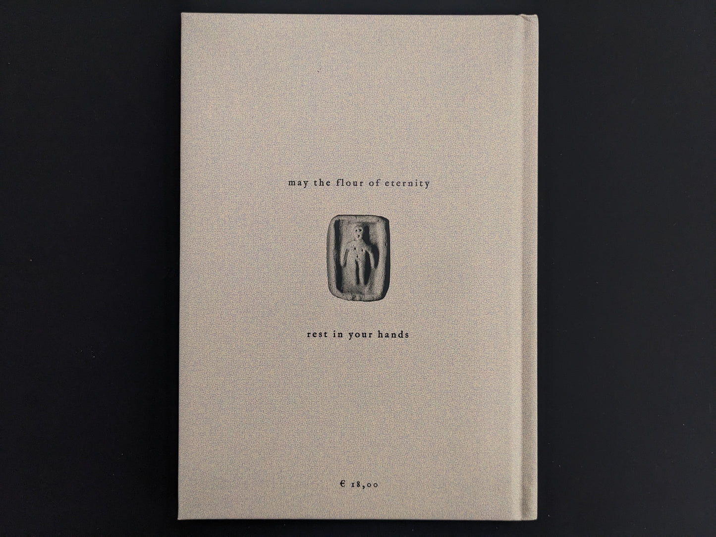 Back cover design of How to Bake a Breadling showing minimalistic Hollow Press artwork