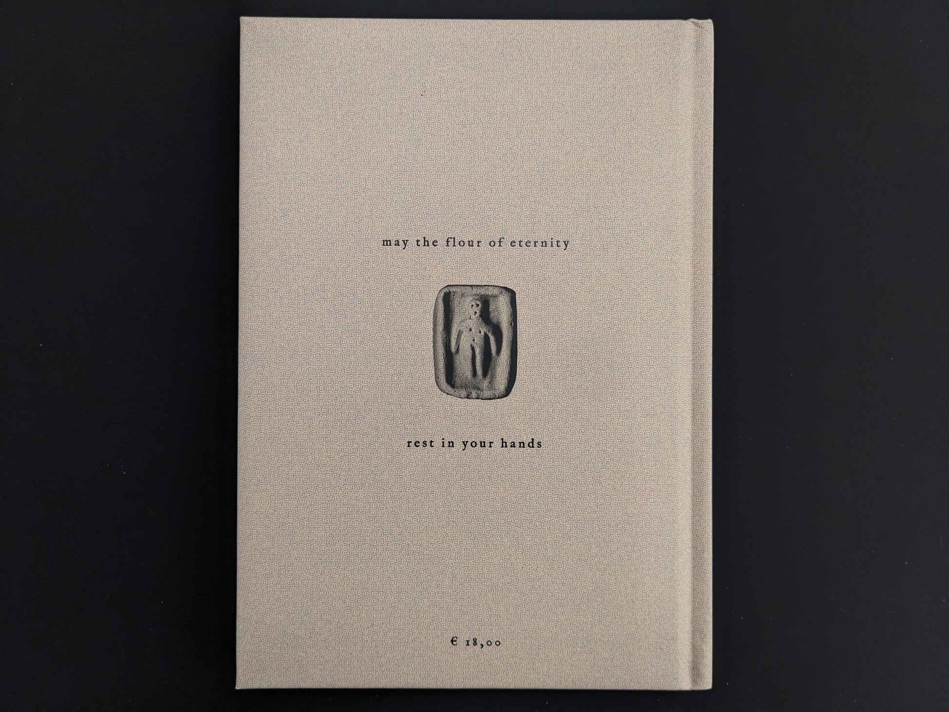 Back cover design of How to Bake a Breadling showing minimalistic Hollow Press artwork