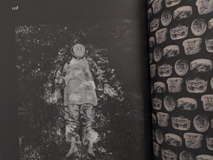Final black and white page with surreal figure lying outdoors