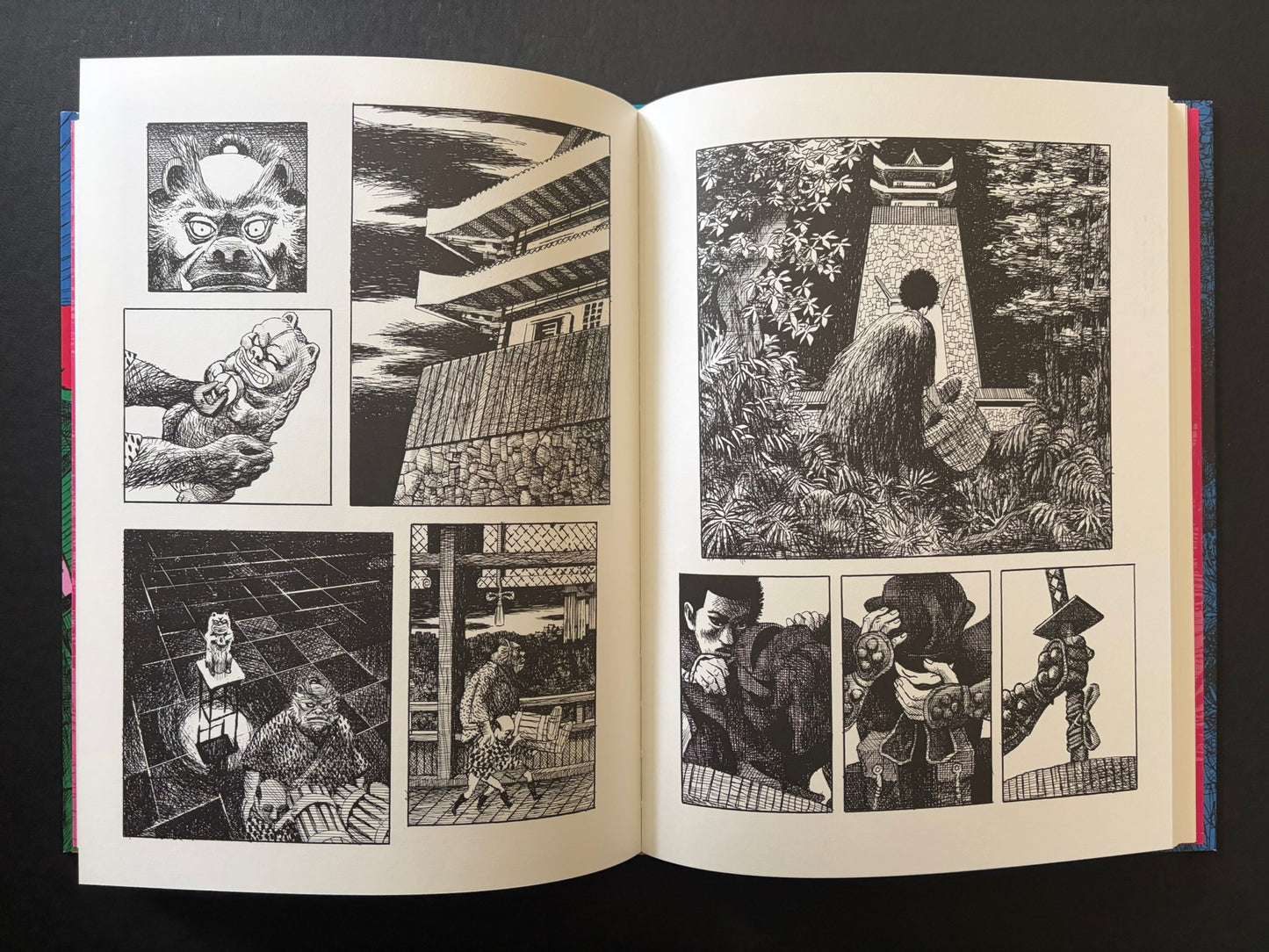 Open GariGari spread with a masked figure in motion, a temple-like building, and a seated character in a wooded setting.
