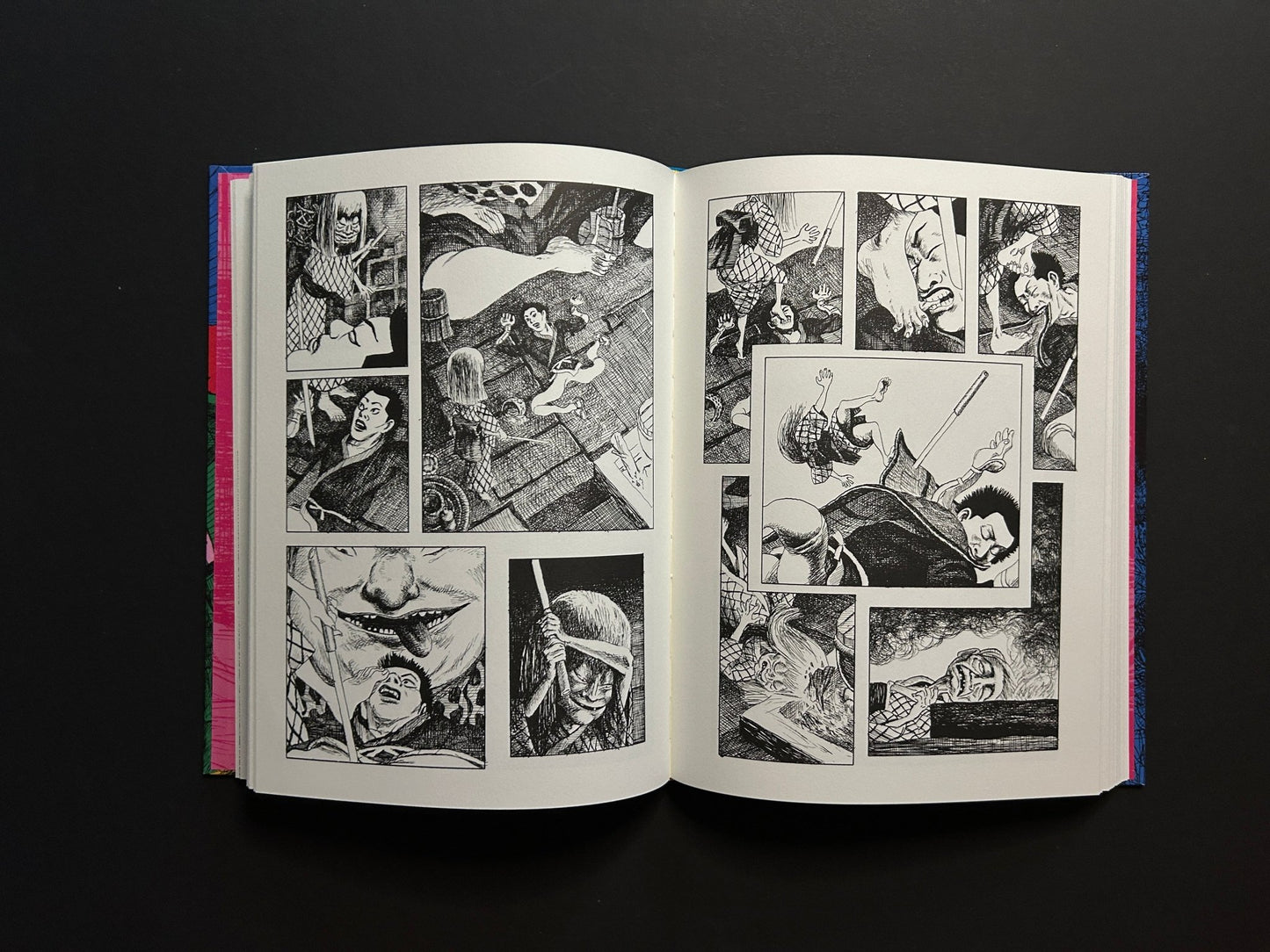 Open GariGari spread with black-and-white comic panels showing close combat and a sword in motion.