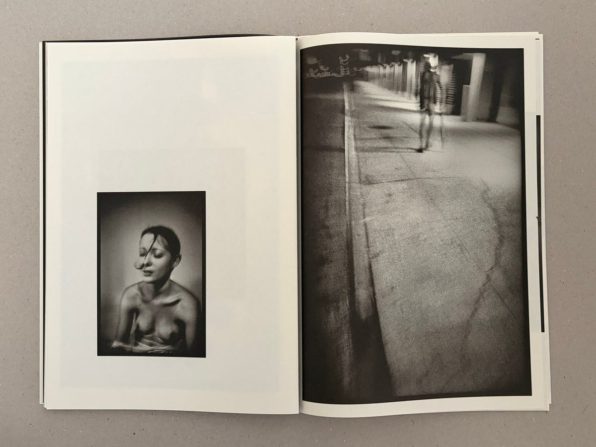 Open spread from Hunger: Epilogue (2nd Ed.) by Michael Ackerman, showing a small black-and-white portrait on the left page and a blurred night street photograph on the right.