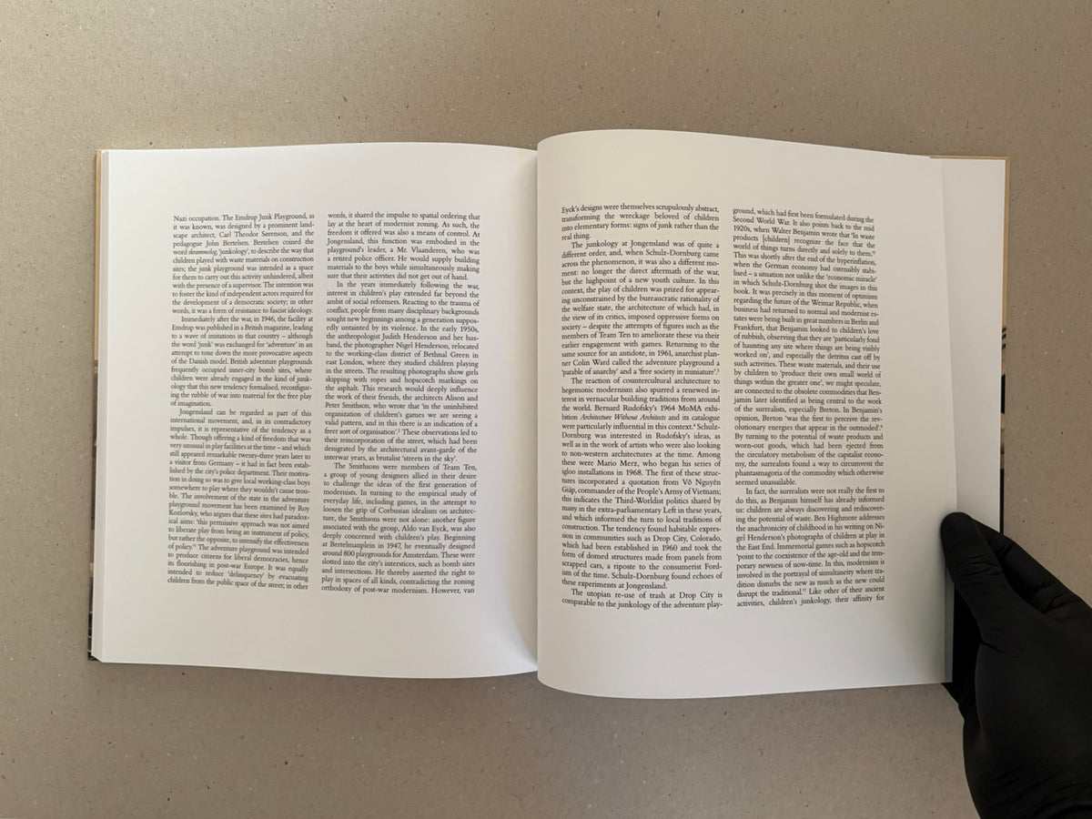 Open spread of Huts, Temples, Castles – Ursula Schulz-Dornburg (Signed Edition), showing a text-heavy interior page layout on cream paper.