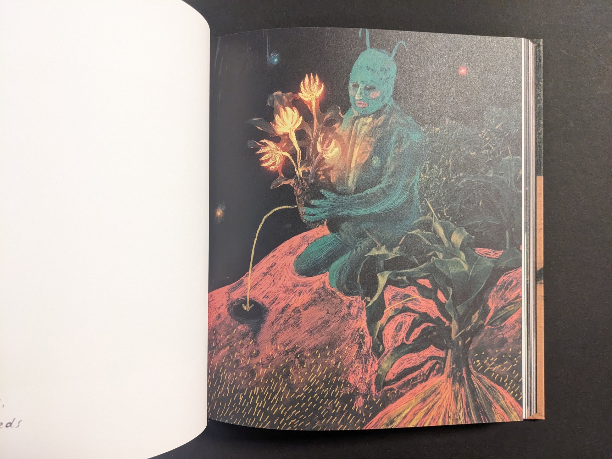 Interior artwork from In a Dark Time, the Eye Begins to See by Julia Soboleva, showing a kneeling blue figure holding glowing flowers with roots.