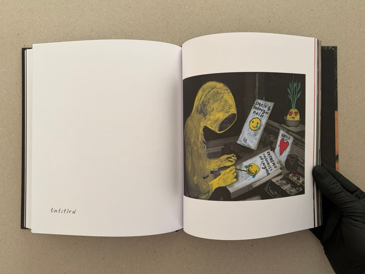 Open artbook spread showing a blank left page and a right-page reproduction of a mixed-media artwork by Julia Soboleva, with a handwritten caption reading “Untitled” at the bottom left.