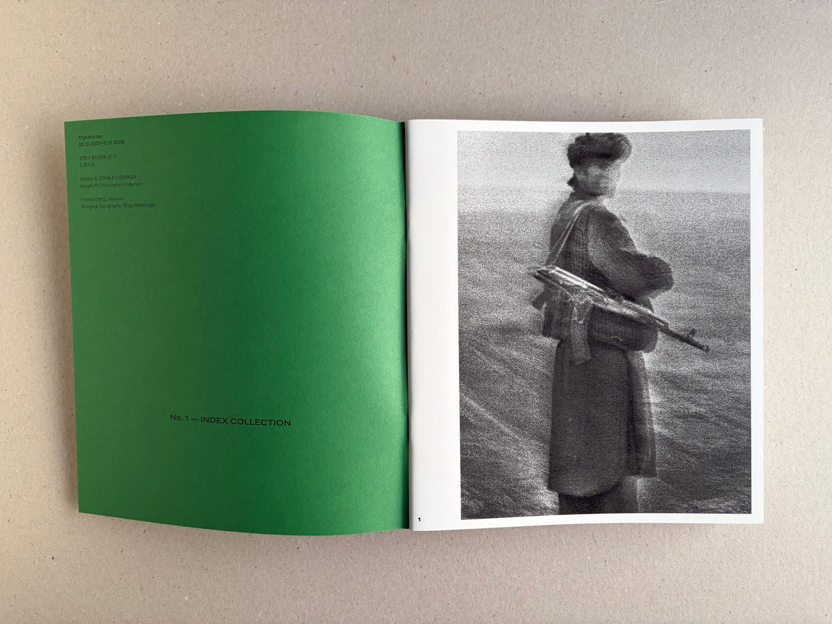 Open Index — Christopher Anderson booklet, with a green title page and a black-and-white photograph on the facing page.