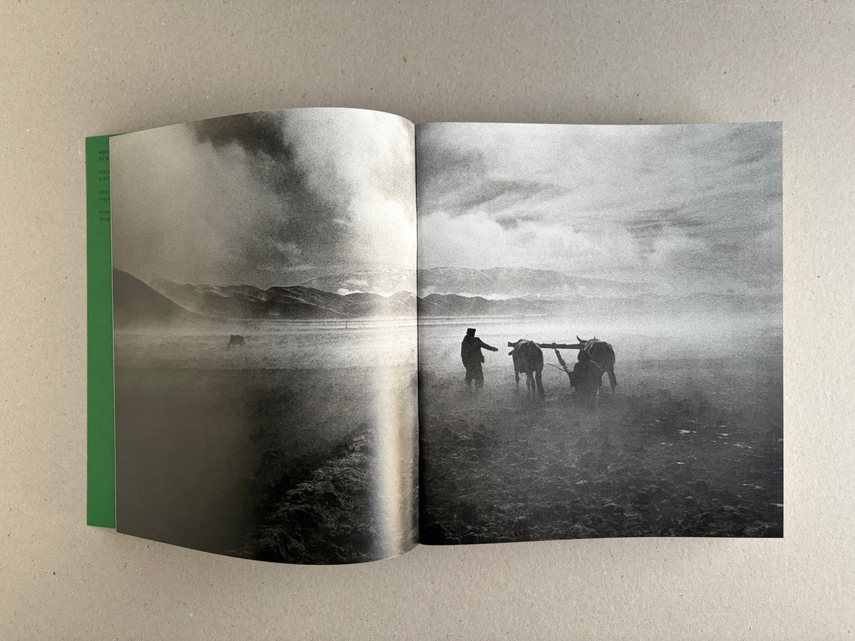 Open Index — Christopher Anderson booklet with a full-bleed black-and-white landscape spread.