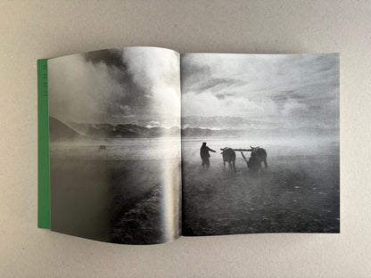 Open Index — Christopher Anderson booklet with a full-bleed black-and-white landscape spread.
