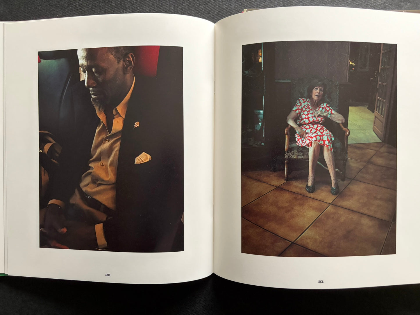 Index by Christopher Anderson, spread with a seated man on the left and an older woman on the right.