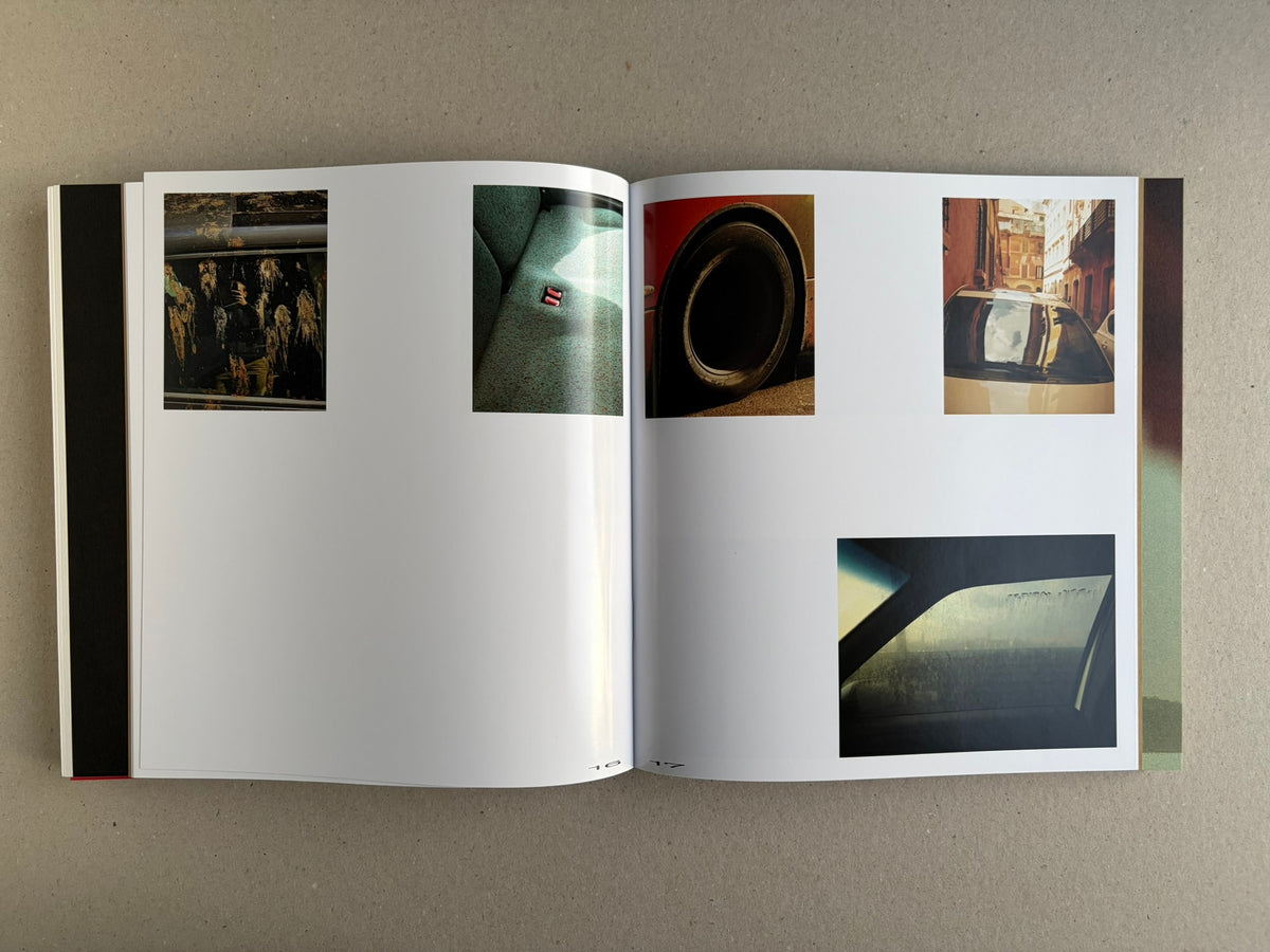 Open Index — Christopher Anderson booklet with small colour photographs of a reflective surface, a wheel, a street, and a car window.