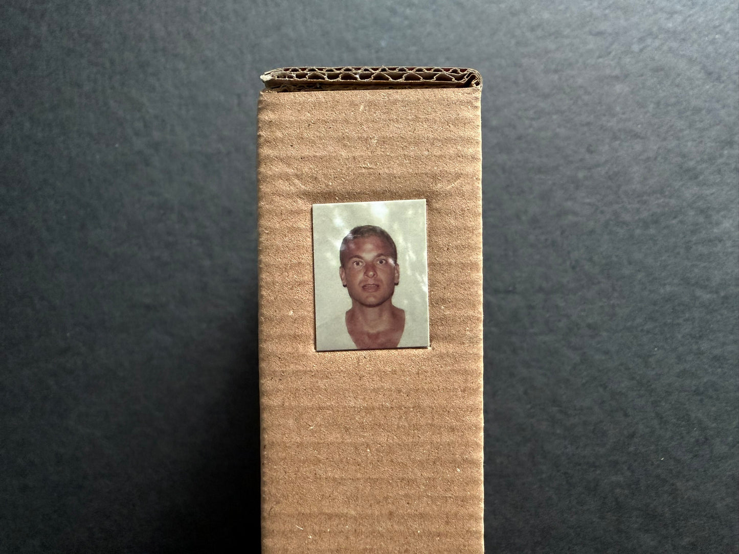 Index by Christopher Anderson, side view of the slipcase with a small portrait label on the spine.