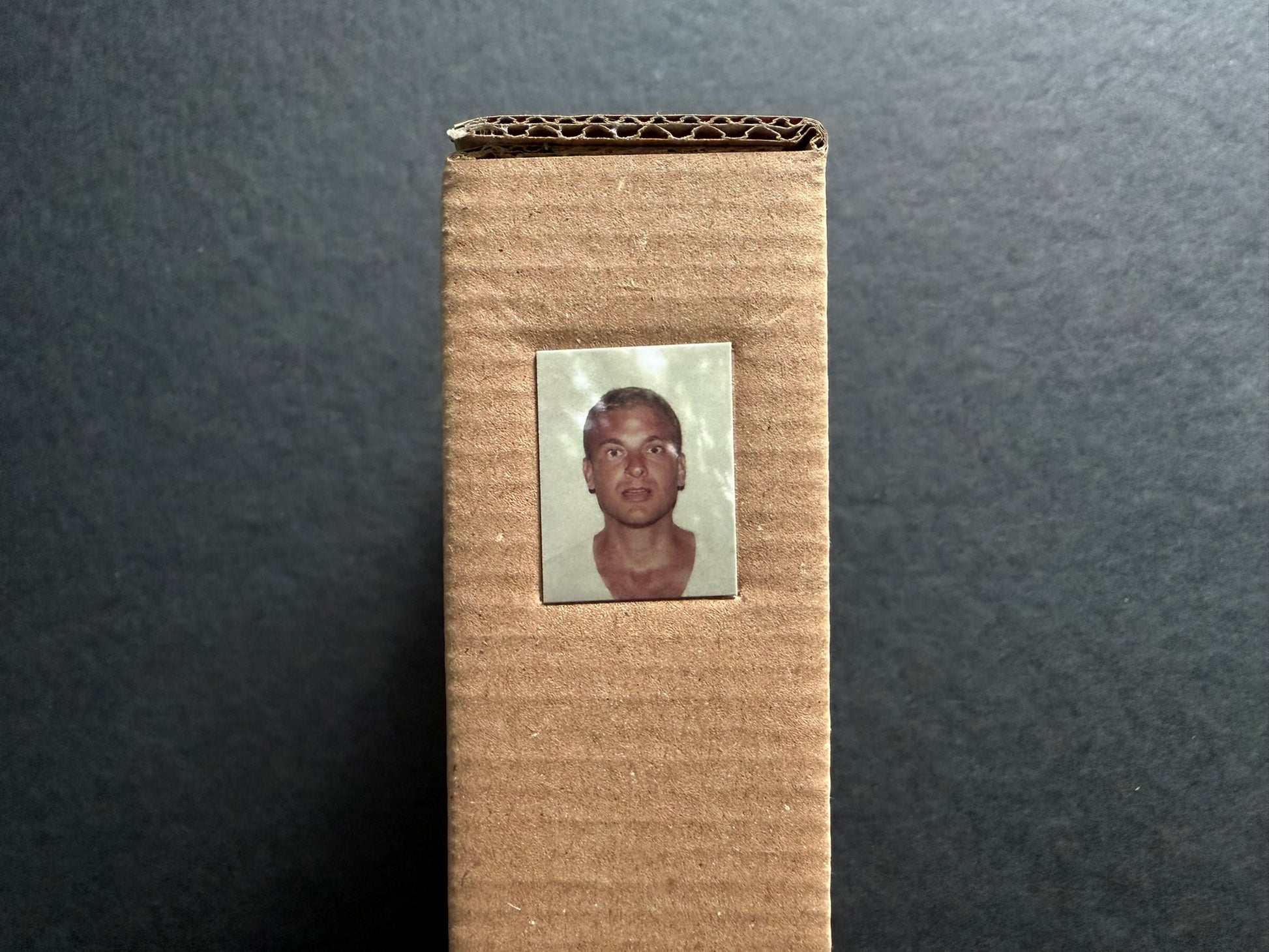 Index by Christopher Anderson, side view of the slipcase with a small portrait label on the spine.