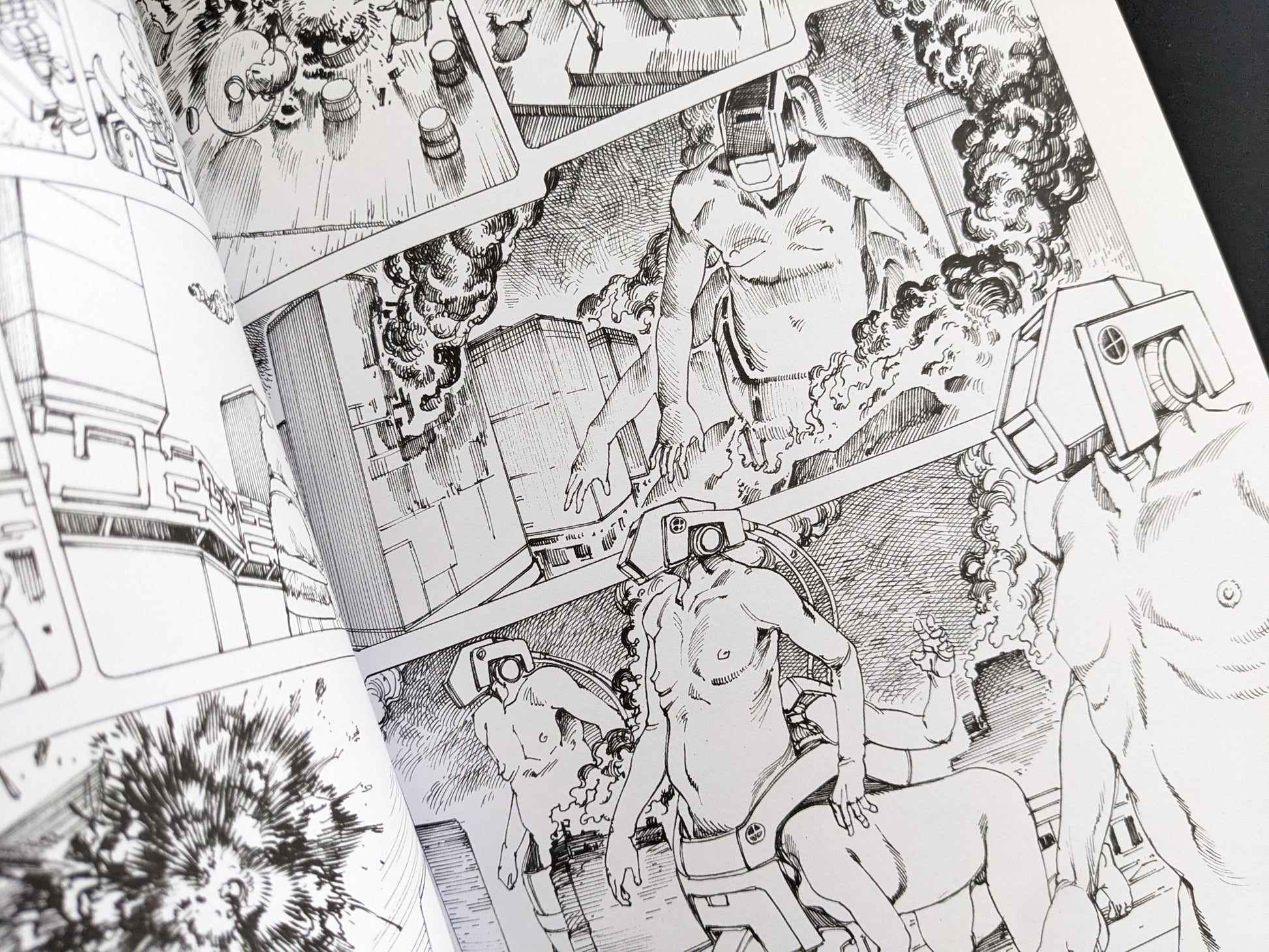 Manga page with humanoid figures in mechanical armor attacking industrial buildings