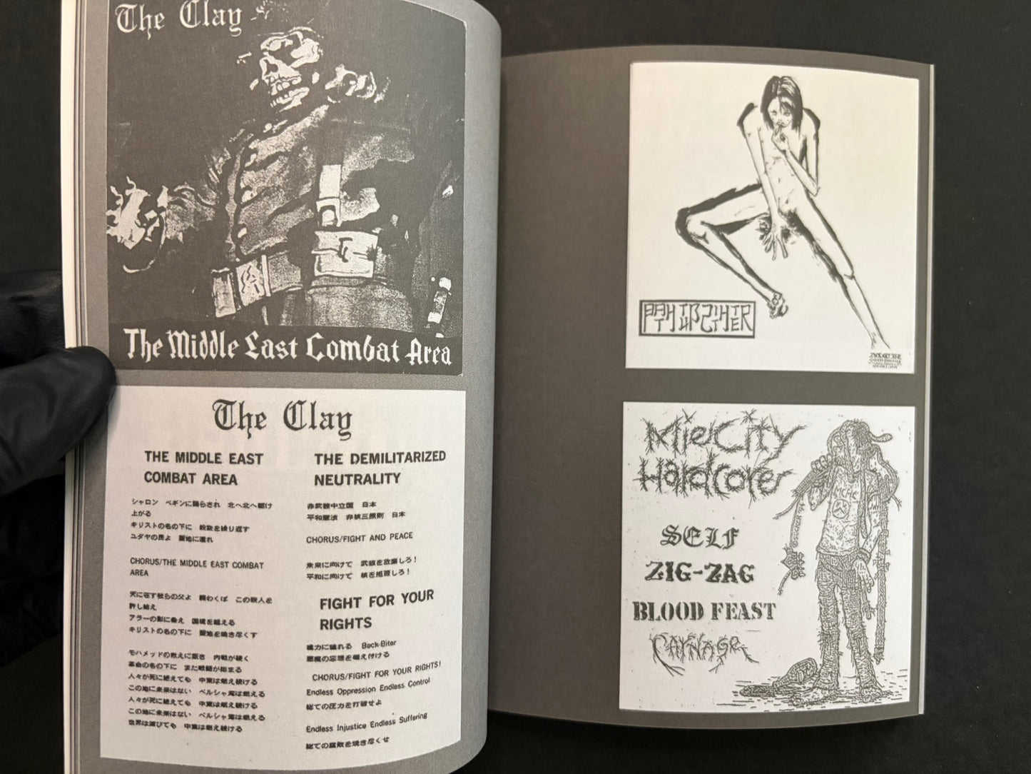 Interior spread of Japanese Punk Graphics (1980–2010) showing black-and-white punk flyers and graphics