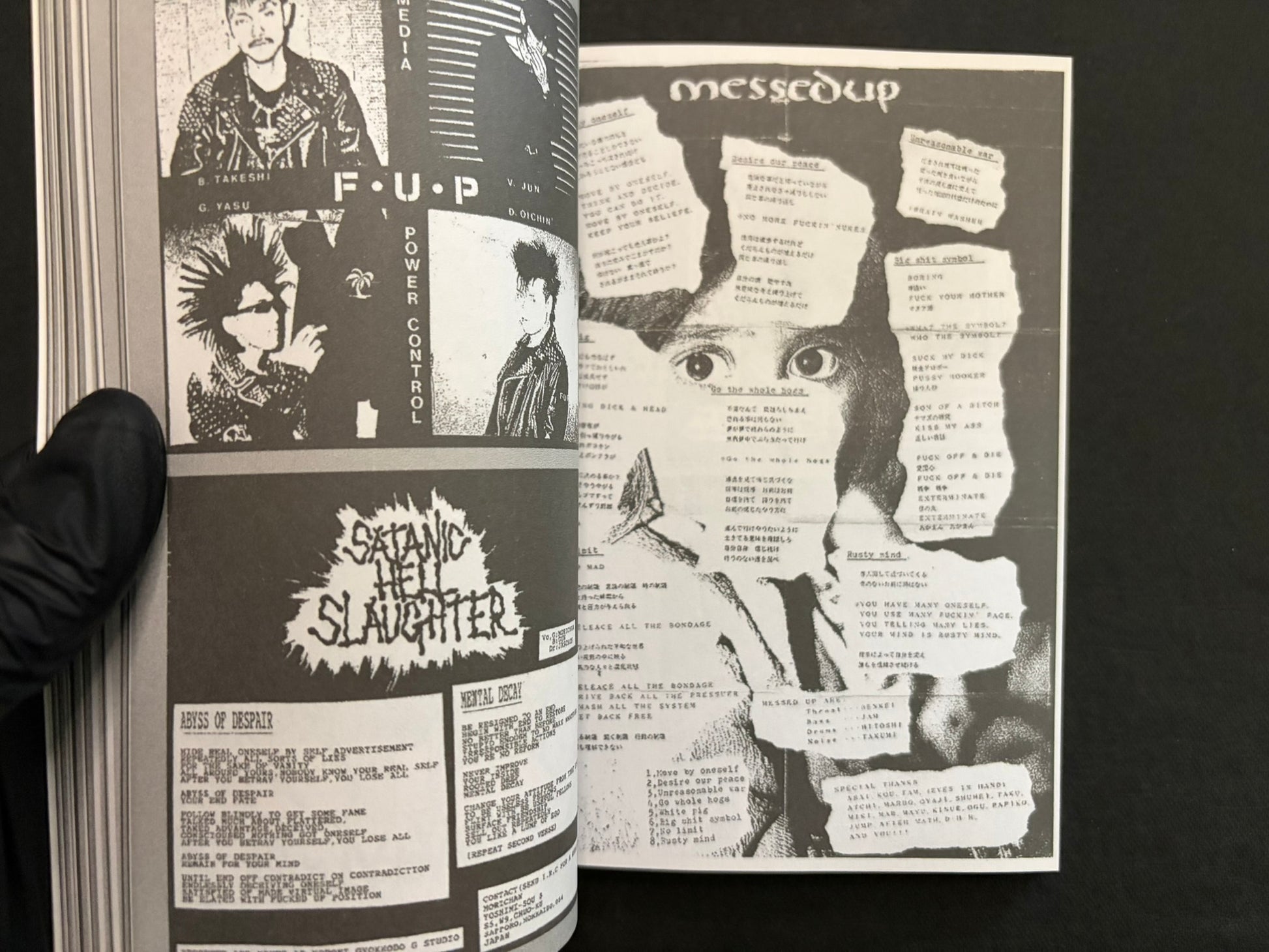 Interior spread of Japanese Punk Graphics (1980–2010) with black-and-white band photos and rough graphic illustrations