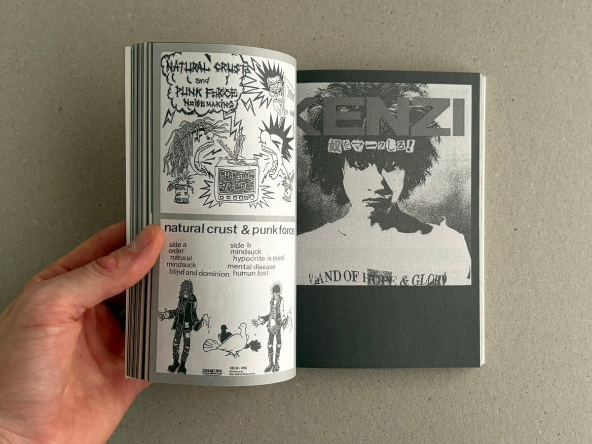 Open spread of Japanese Punk Graphics (1980-2010), showing black-and-white punk graphics and typography.