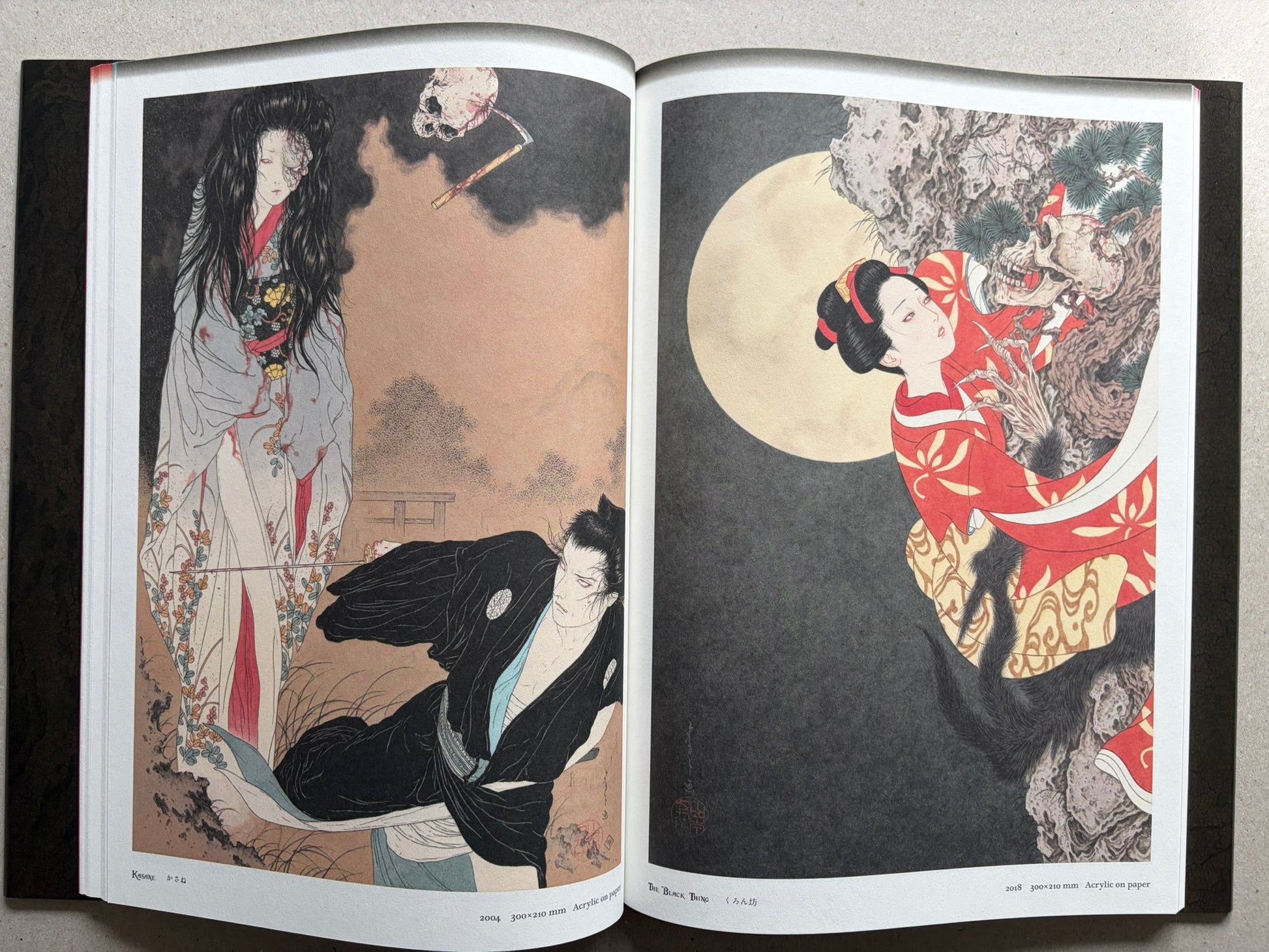 Japonesthétique by Takato Yamamoto opened to a spread with a ghostly figure, a masked character, and a seated couple.