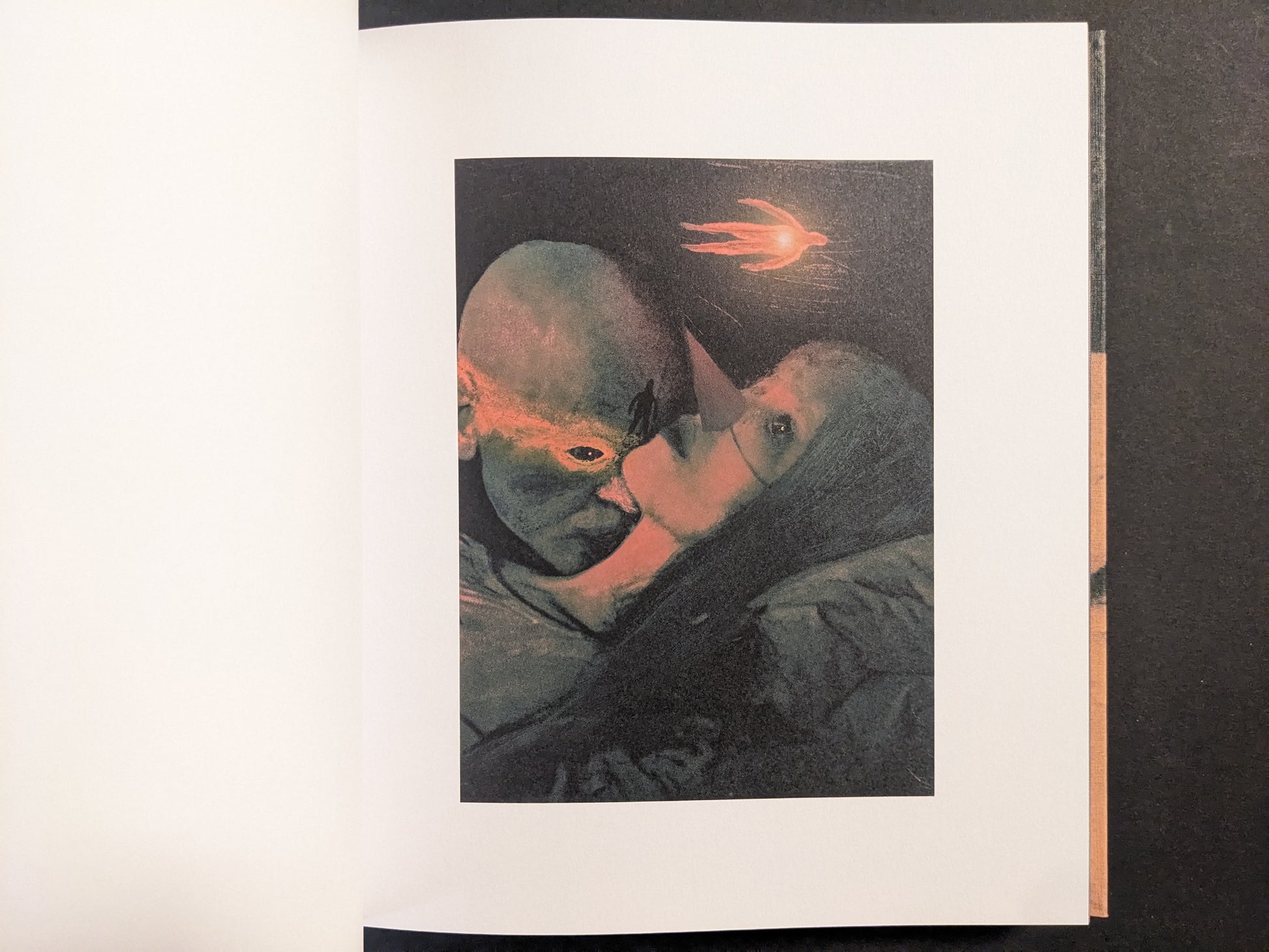 Interior artwork from “In a Dark Time, the Eye Begins to See” by Julia Soboleva, depicting two faces in close embrace with a red comet-like form above.