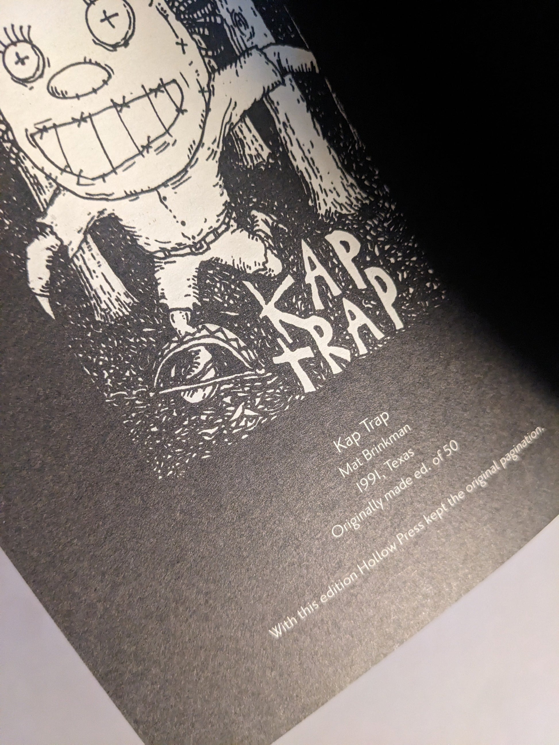 Title page for KAP TRAP by Mat Brinkman, with 1991 and Texas noted.