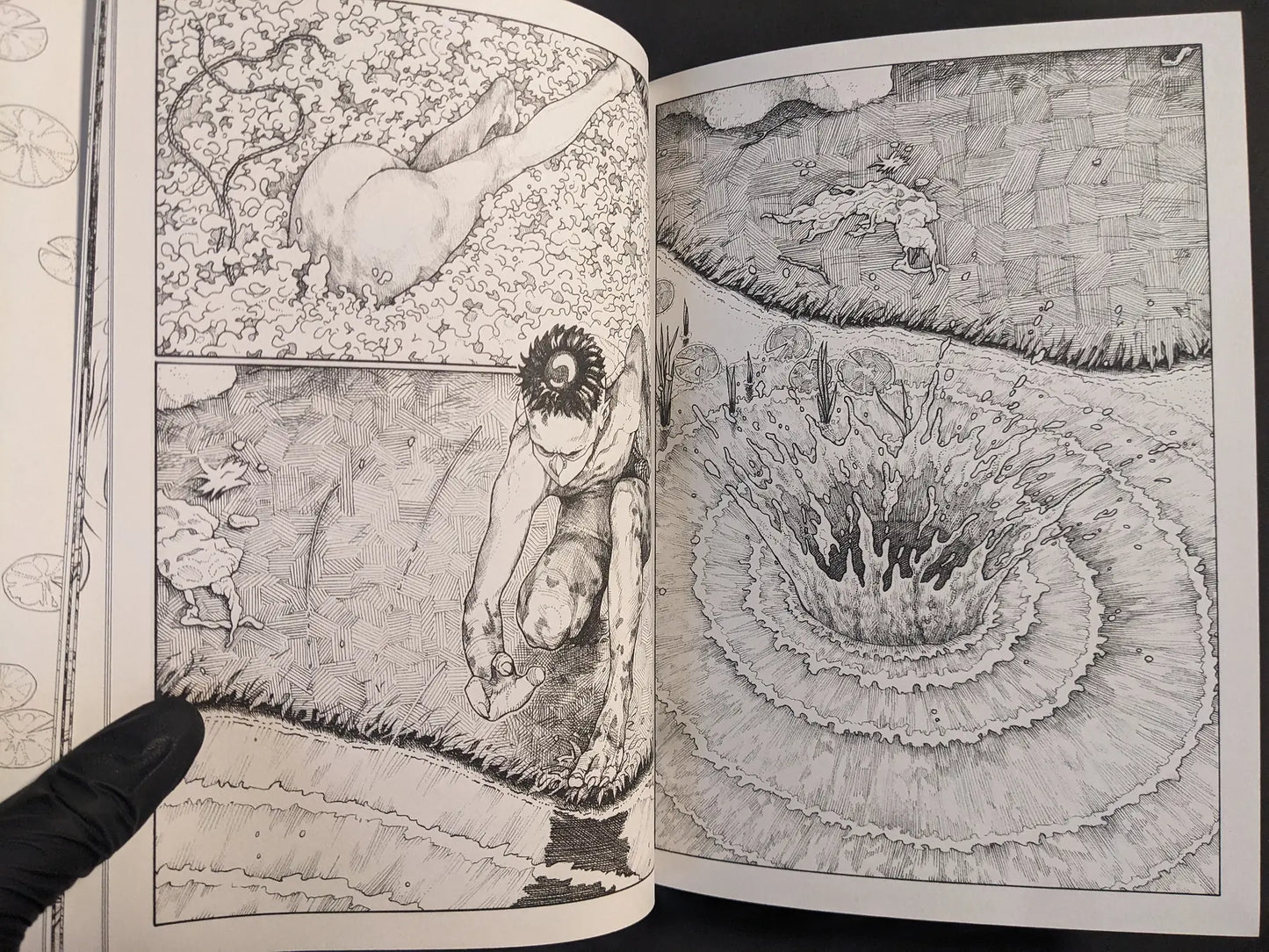Interior panels with a figure emerging from foam and a water splash, black-and-white ink