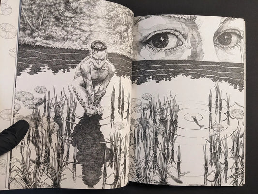 Interior spread with a kappa-like figure by water and large eyes above the horizon, black-and-white ink