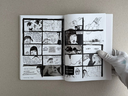Open spread of KSKHH (3°ed.) by Daisuke Ichiba, showing black-and-white comic pages with hand-drawn panels and text, held open by a gloved hand.