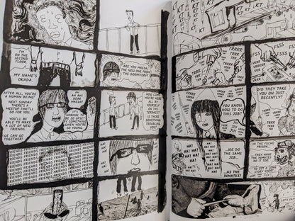 Interior page from "KSKHH" featuring dialogue-driven comic panels in Ichiba’s grotesque style