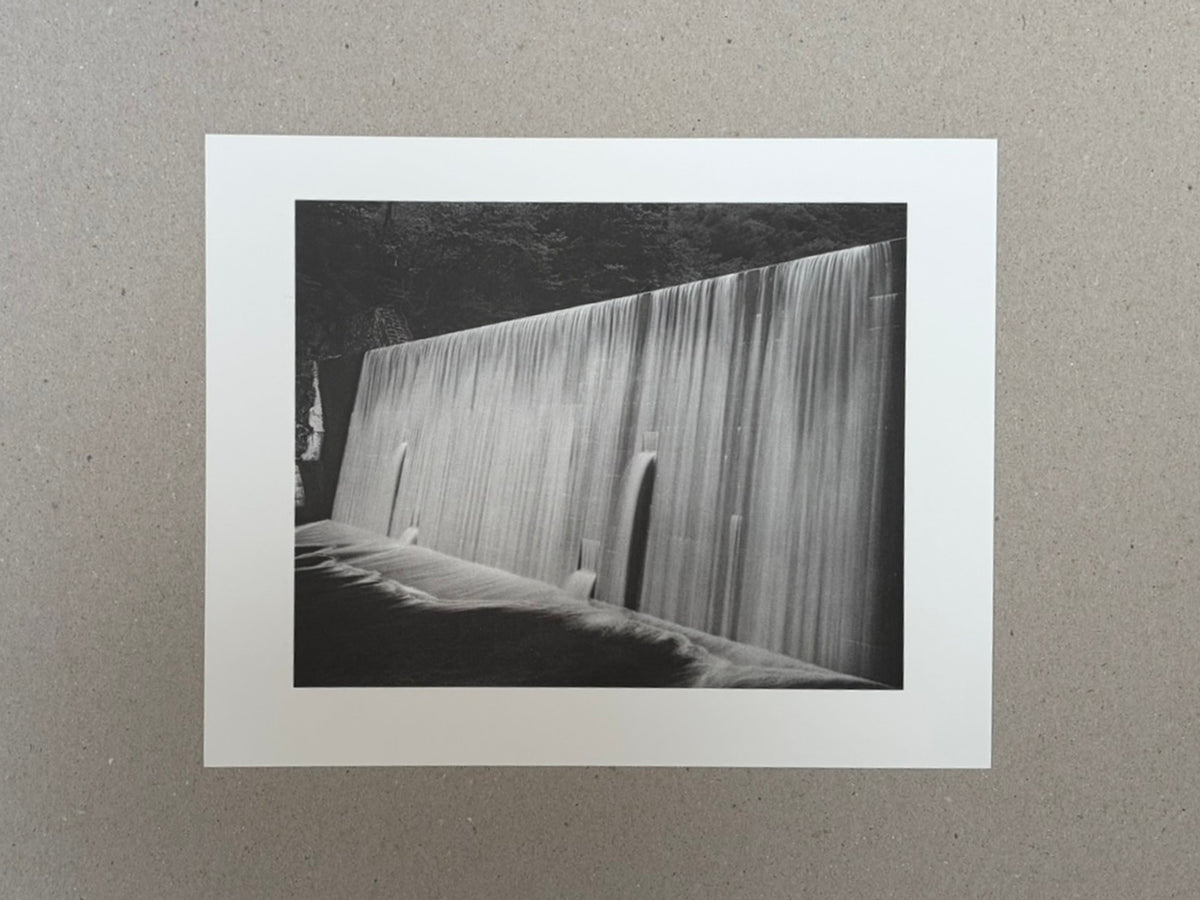 Landscape — Toshio Shibata collotype print showing a black-and-white photograph of a concrete dam or retaining wall with water flowing down its face.
