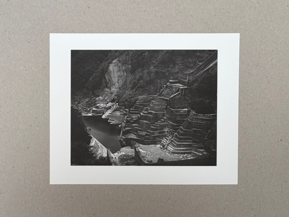 Landscape — Toshio Shibata collotype print showing a black-and-white landscape with concrete retaining walls and a river in a mountain valley.