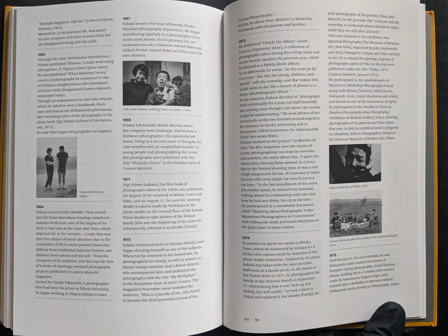 Open spread with a biographical timeline, text columns, and small archival photographs.