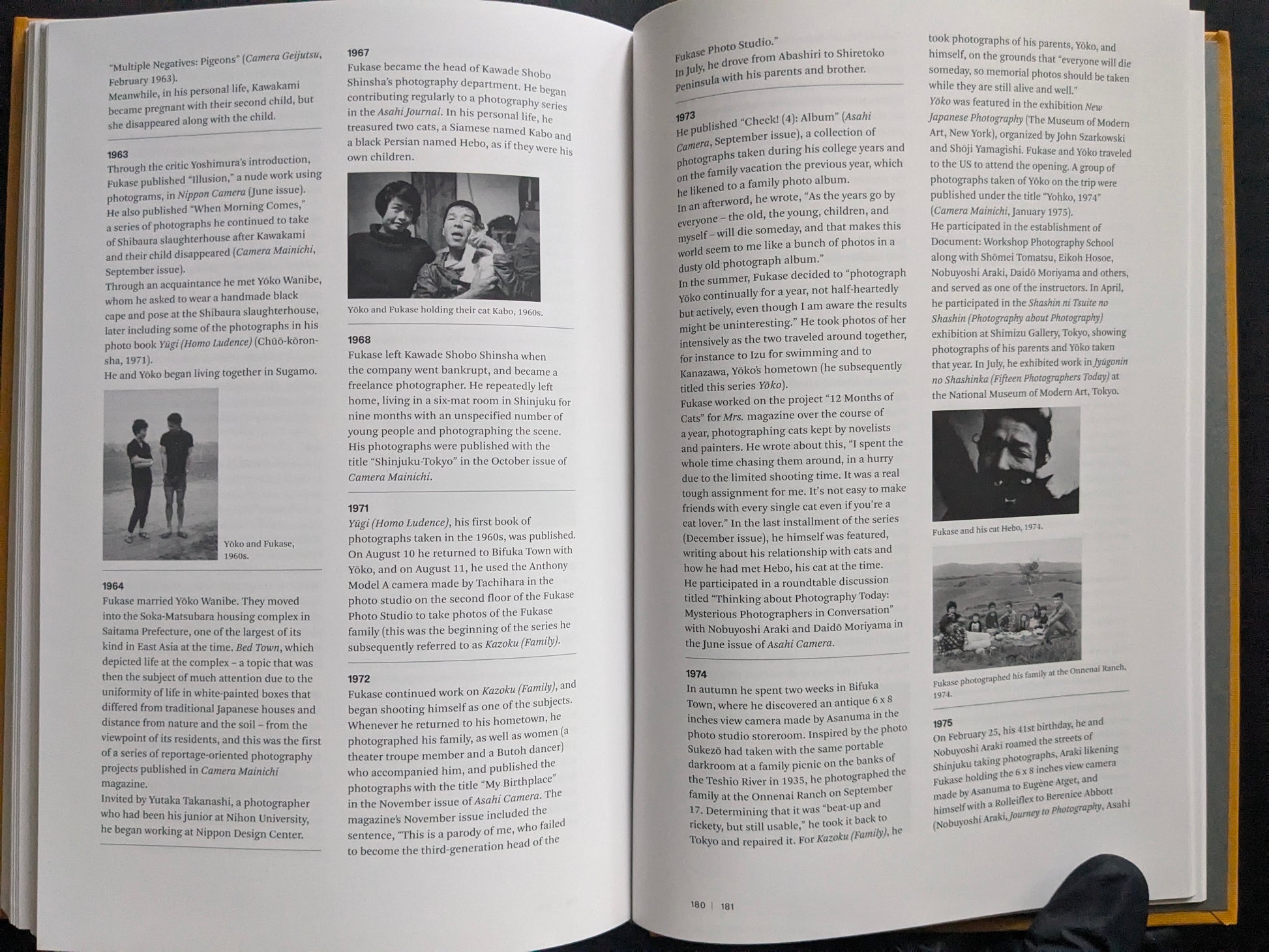 Open spread with a biographical timeline, text columns, and small archival photographs.