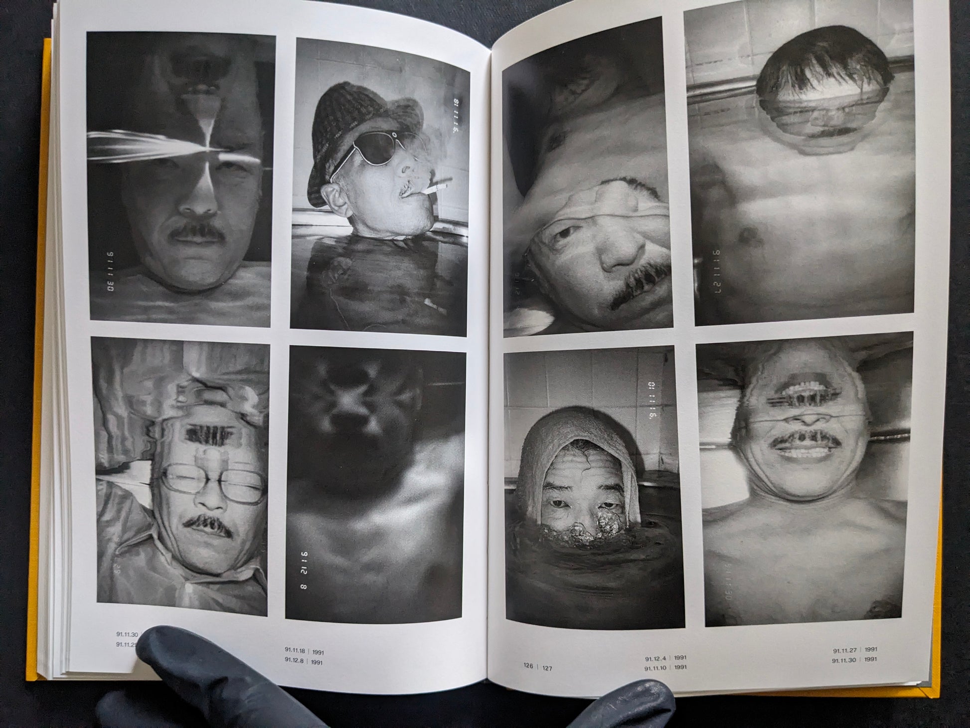 Open spread with a contact-sheet style grid of underwater self-portraits in a bathtub.