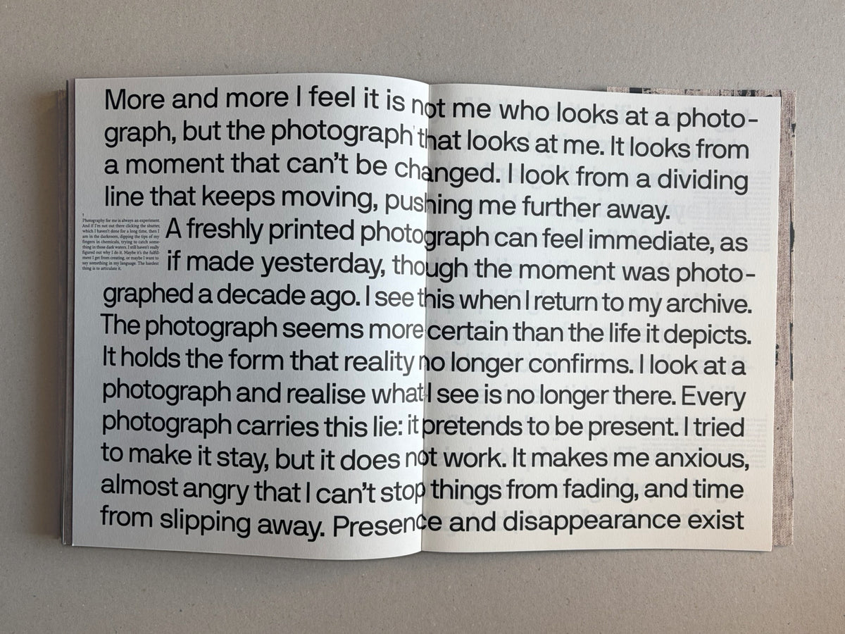 Open spread of Materia by Vic Bakin with large black text across both pages on a light background.