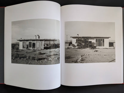 Double-page spread showing two desert homes