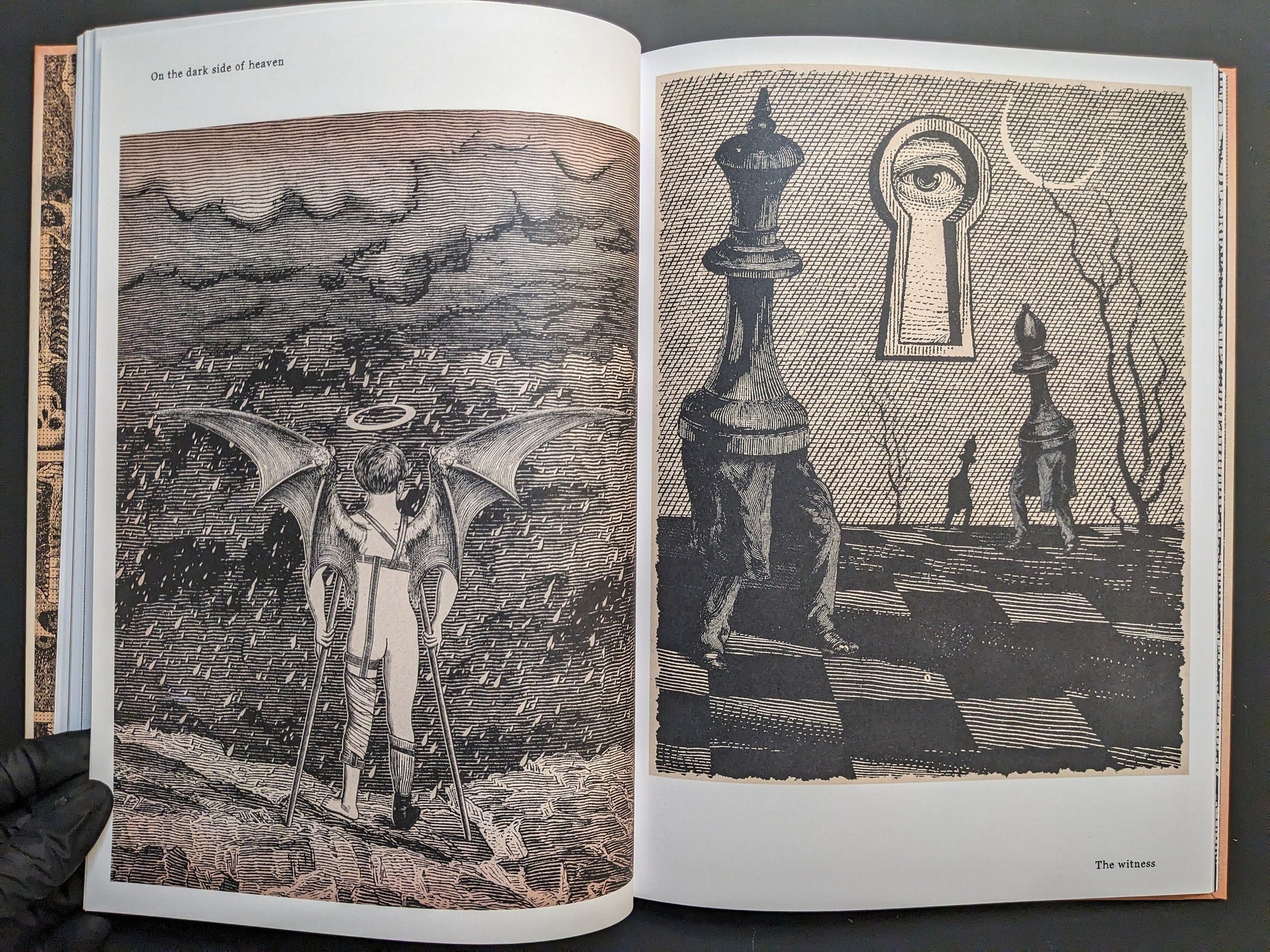 Double-page spread from METAFABLES, showing an interior detail and a falling figure in a scene titled On the dark side of heaven.