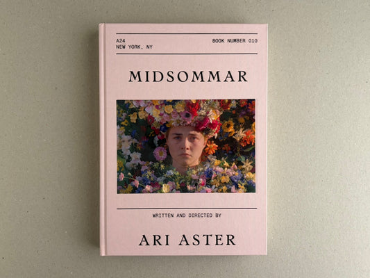 Front cover of Midsommar screenplay book by Ari Aster, showing a pale pink cover with the title and a central film still framed by flowers.