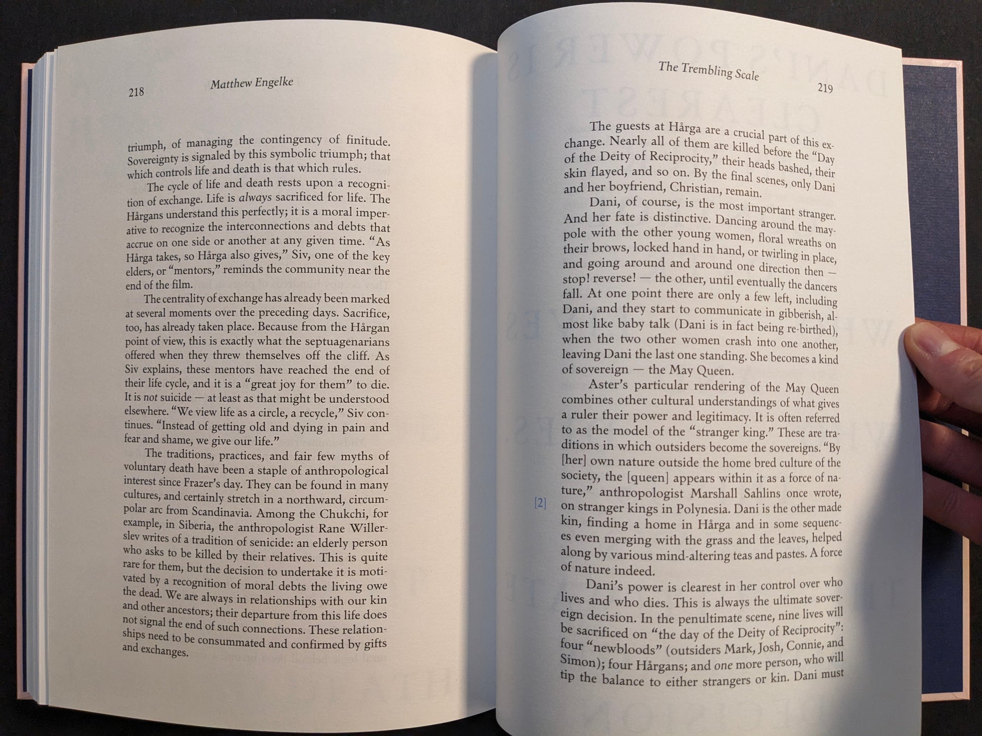 Interior essay spread from the Midsommar screenplay book with critical writing on symbolism, sacrifice, and community.