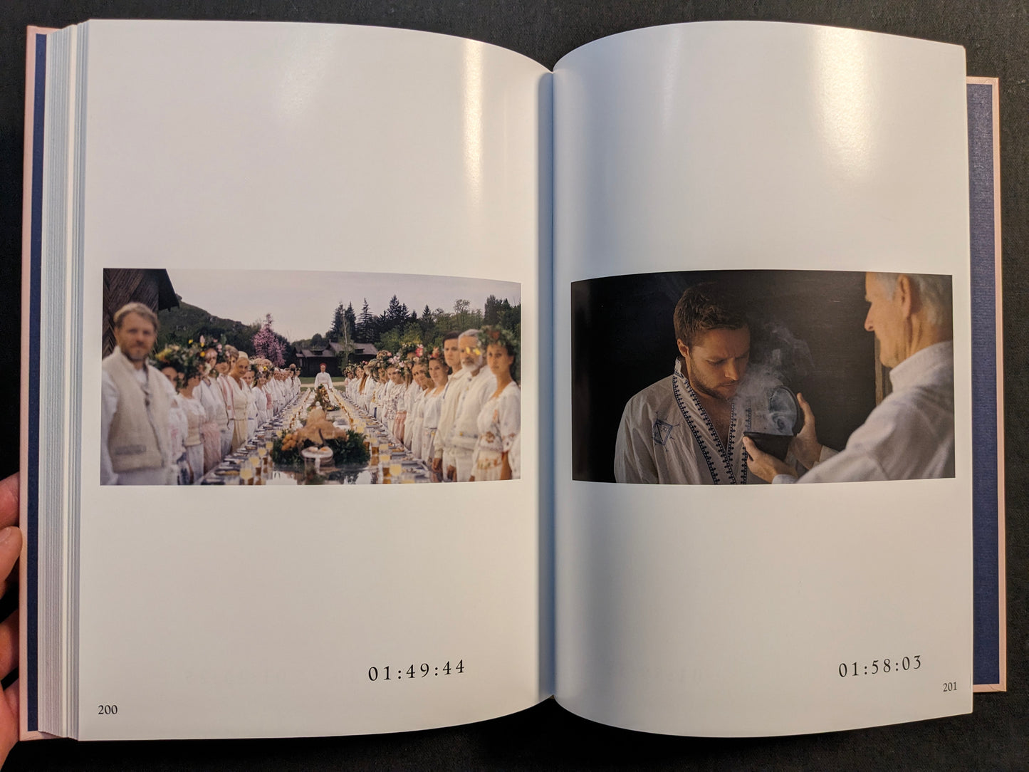 Interior spread with Midsommar film stills showing a ceremonial feast and a ritual scene.