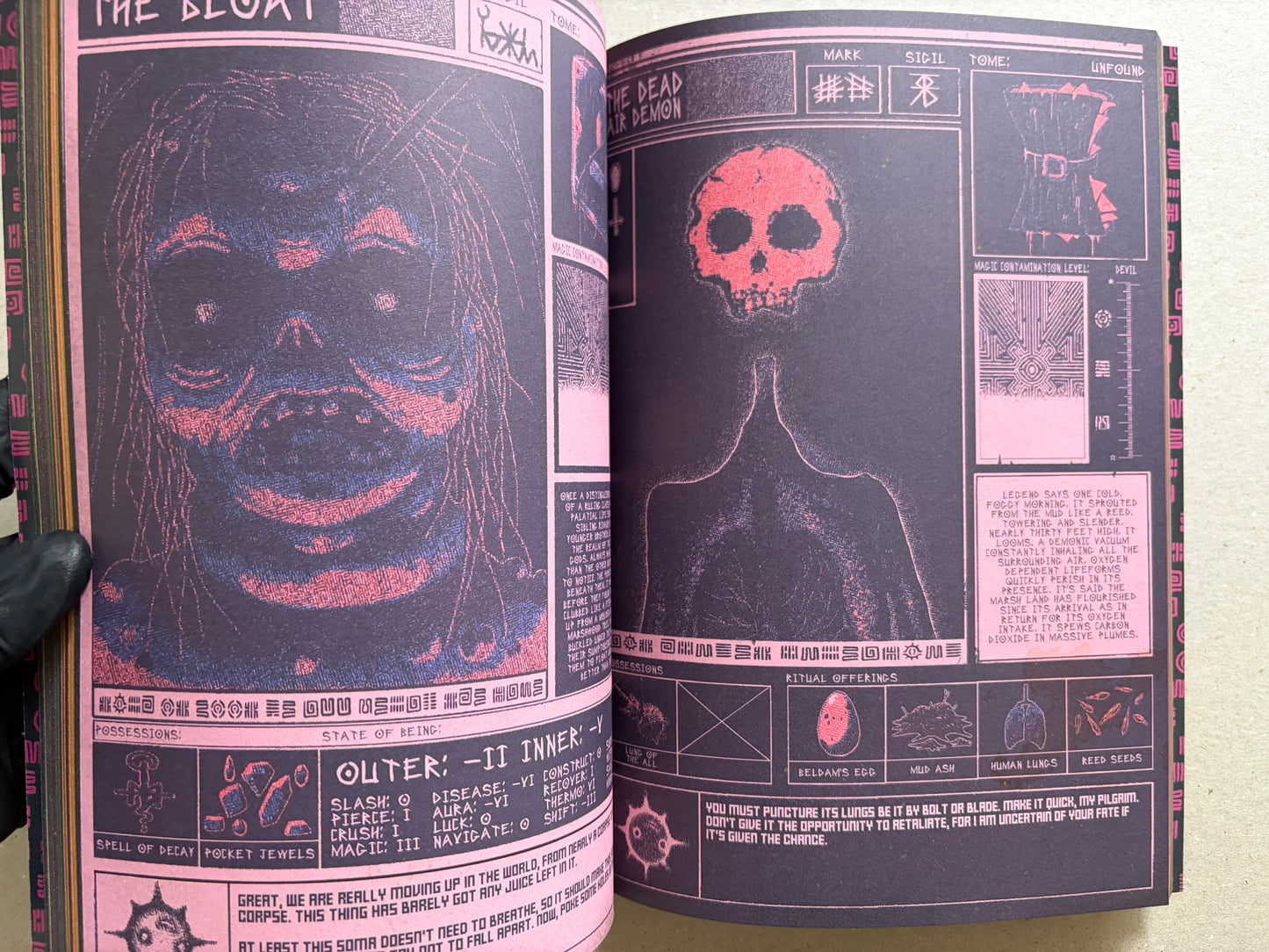 Interior spread of Mock Soul "maze devil pilgrimage" with close-up monster faces on the left page and a skull-headed figure on the right page.
