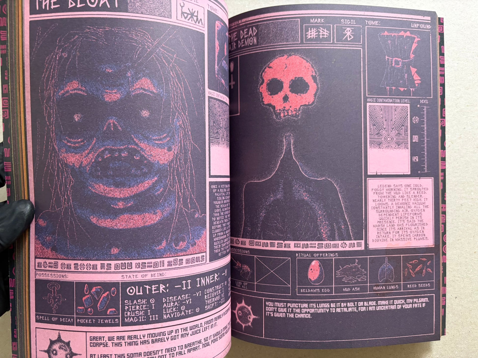 Interior spread of Mock Soul "maze devil pilgrimage" with close-up monster faces on the left page and a skull-headed figure on the right page.