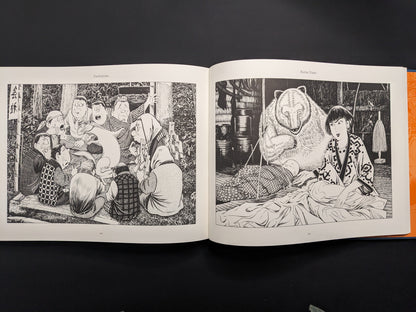 Open book displaying black and white illustrations on a dark background