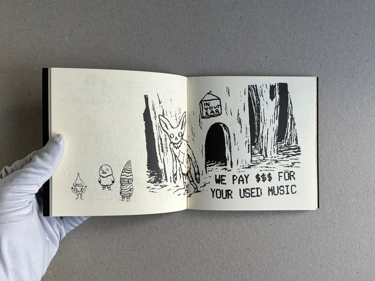 Open sketchbook spread from Multiforce Shit by Mat Brinkman, showing small character drawings on the left page and a black-and-white scene with text on the right page.