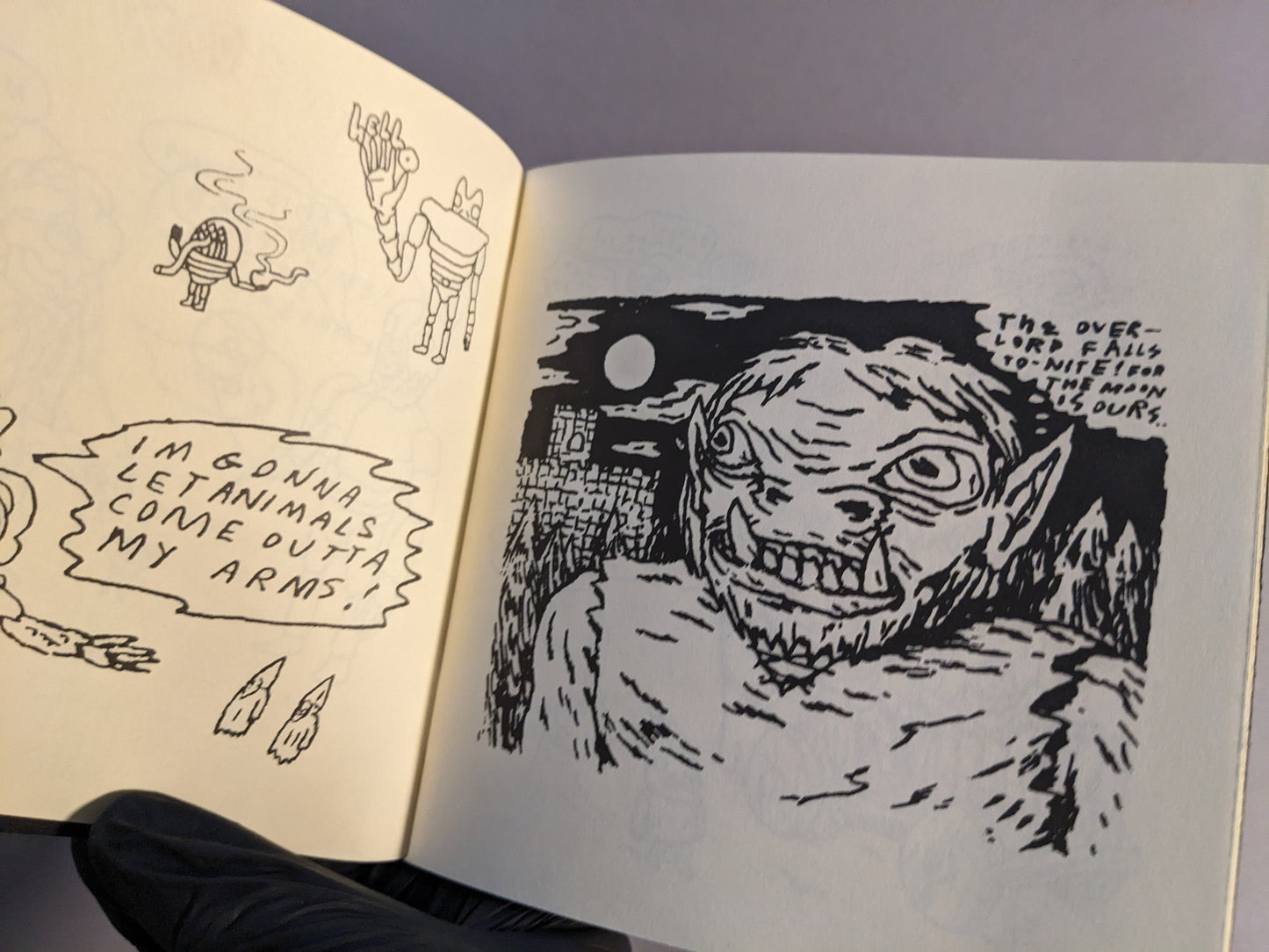 Two-page spread with experimental drawings and handwritten text in Multiforce Shit