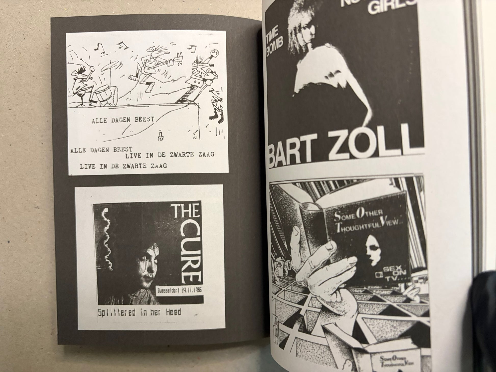 Open spread with black-and-white graphics and cut-out layouts, including Alle Dagen Beest, The Cure, and Bart Zoli.