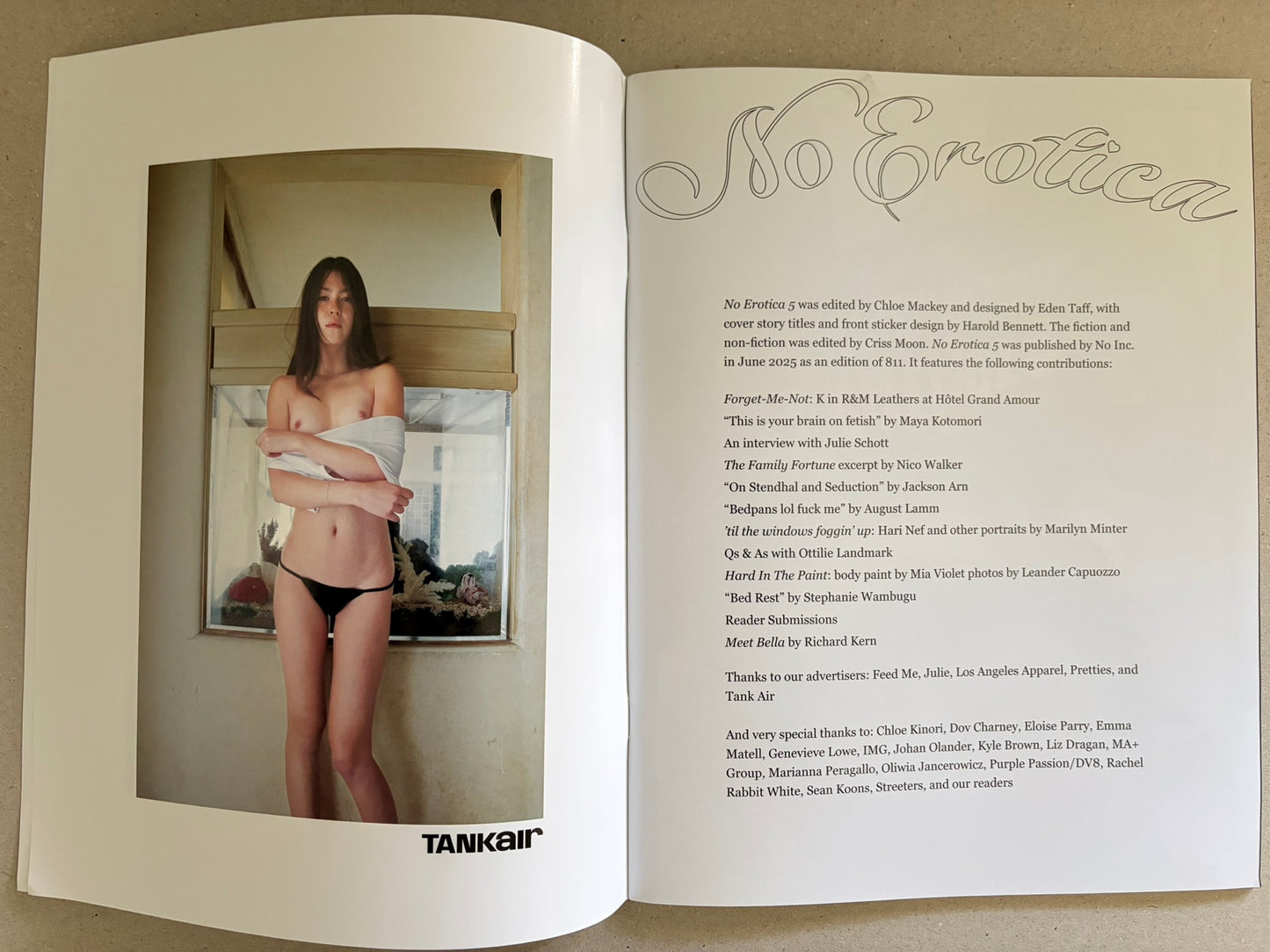 No Erotica No. 5 open to a title spread with a full-page portrait and credits page