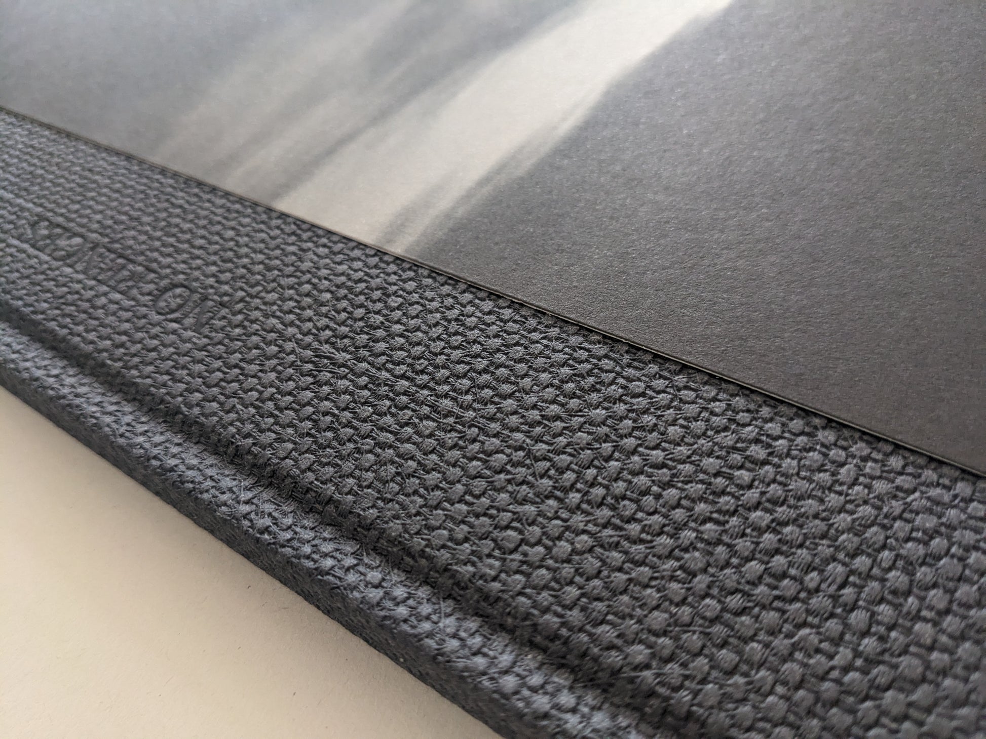 Close-up of the textured spine and interior black-and-white photograph in 'No Fences'